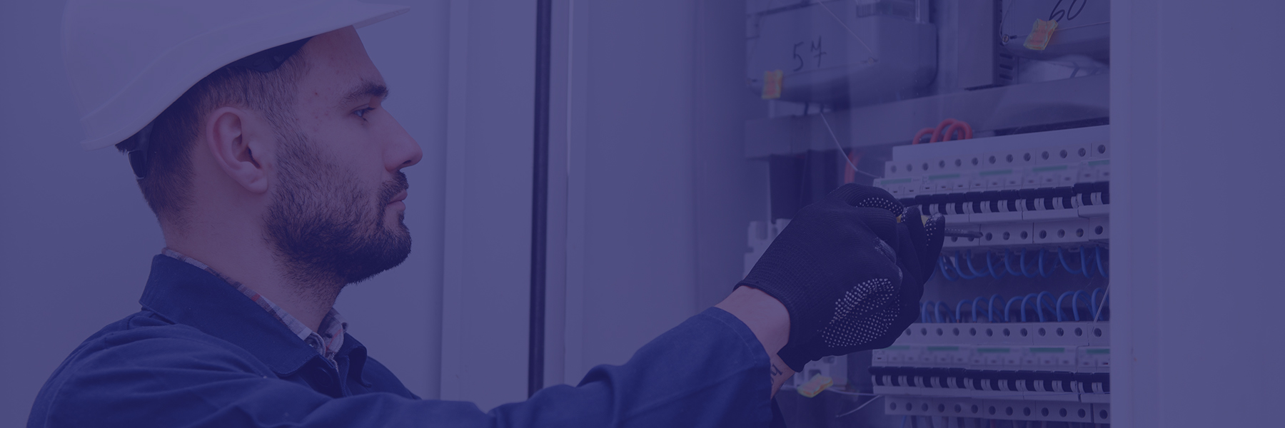 Electrician checking a comsumer unit at home